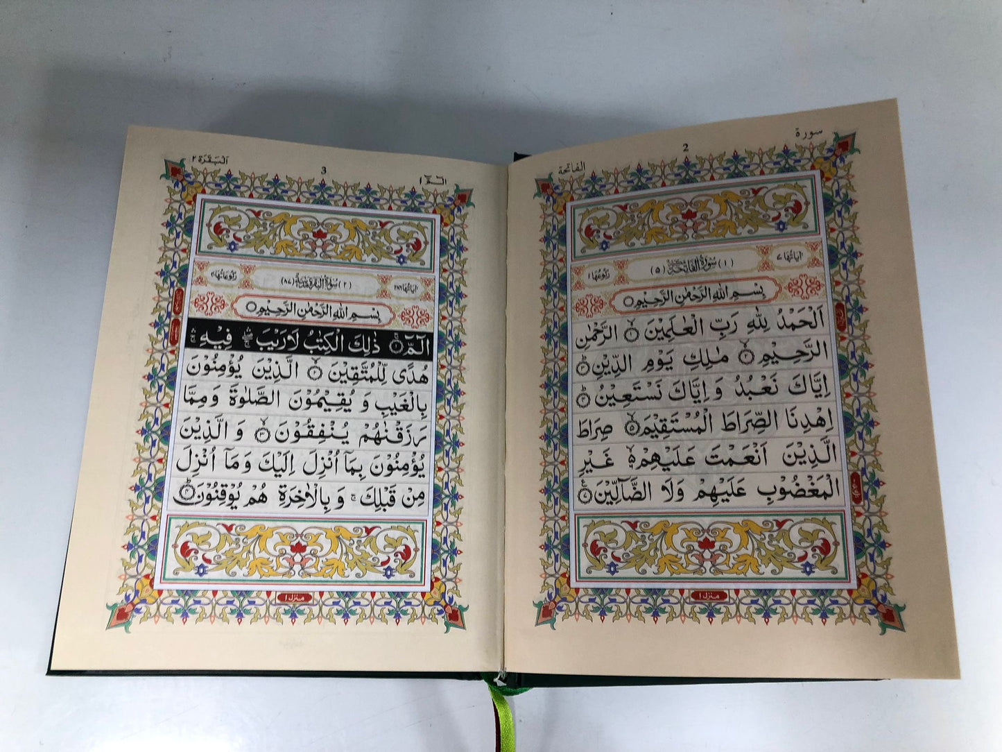 Hold Quran with Tajweed rules